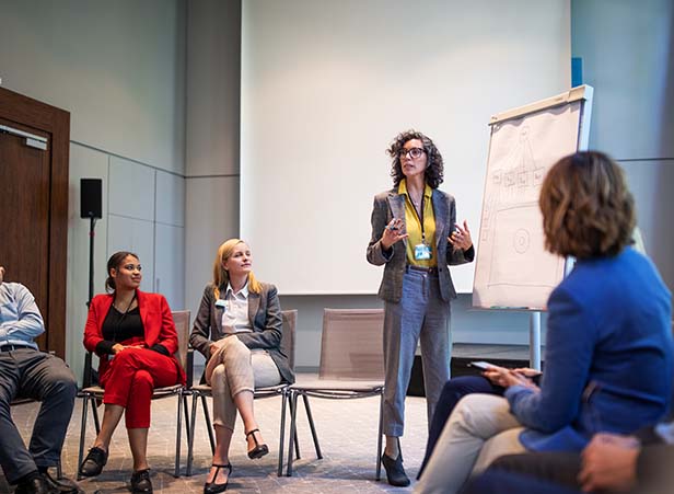 Business woman giving a workshop