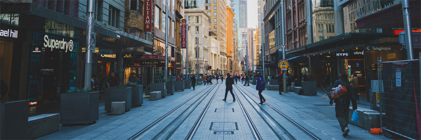Street with retail businesses on each side 